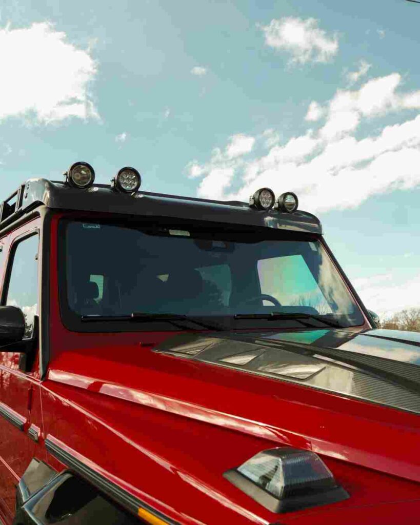 Brabus carbon roof wind deflector with LED lights installed on a Mercedes G-Wagon
