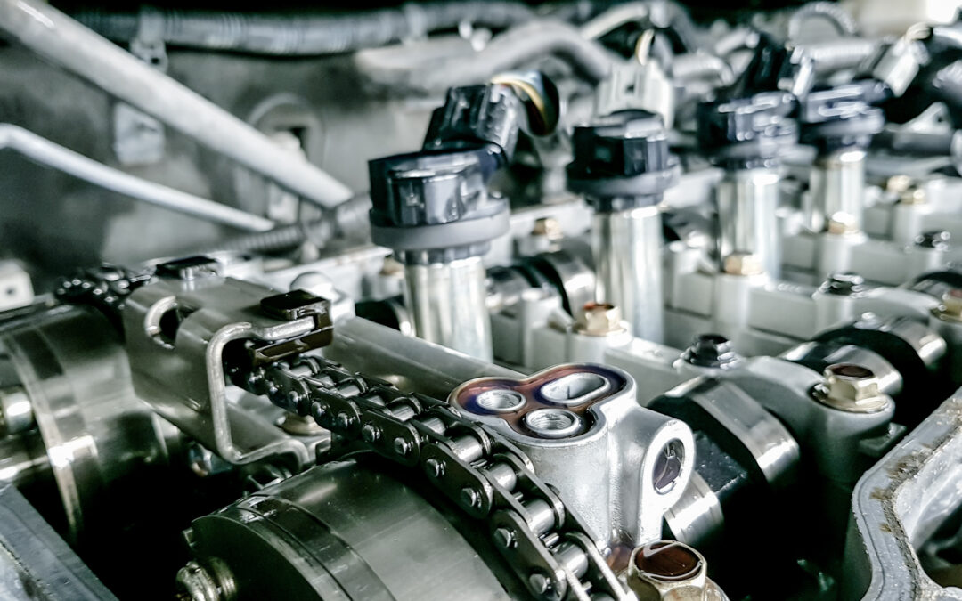 View of a car engine timing belt with other engine components.