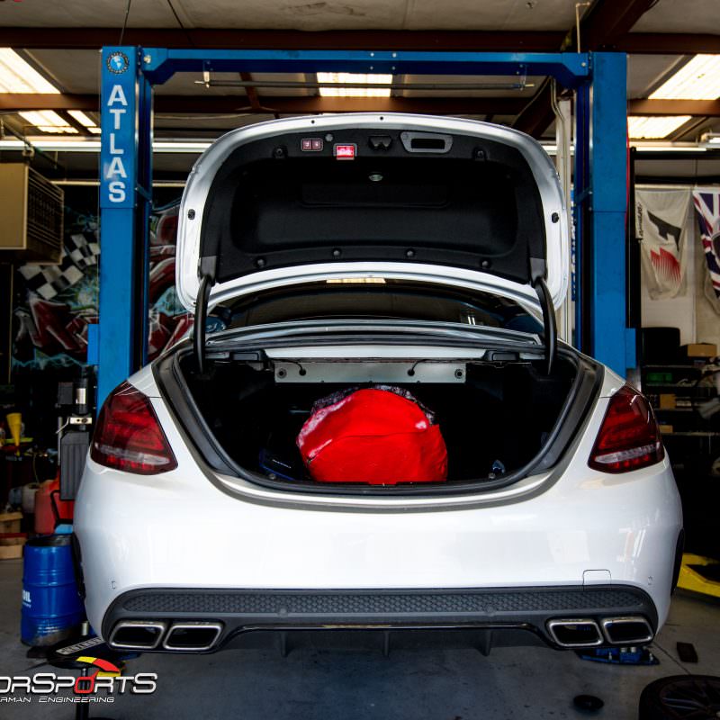 c63 amg in for downpipe install and brake job