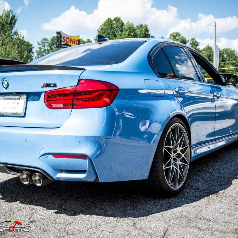 bmw m3 f80 in for akrapovic exhaust and carbon fiber bits, previously installed carbon fiber rearview mirror covers and now were installing carbon fibre diffuser, front splitters and front lip, marina blue m3 looks stunning!