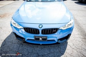 bmw m3 f80 in for akrapovic exhaust and carbon fiber bits, previously installed carbon fiber rearview mirror covers and now were installing carbon fibre diffuser, front splitters and front lip, marina blue m3 looks stunning!