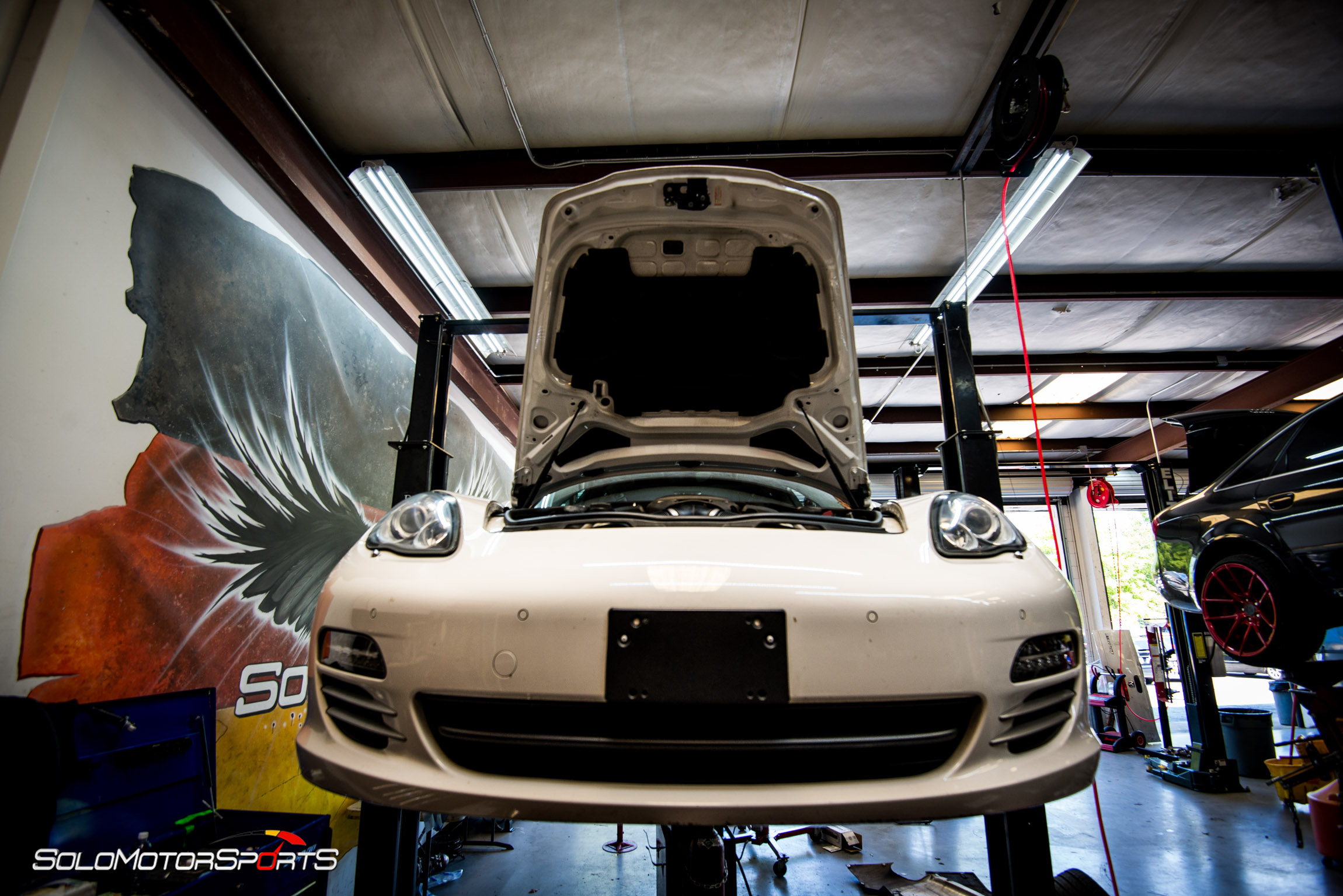 Porsche Panamera 4S in for custom exhaust installation by solo motorsports atlanta ga