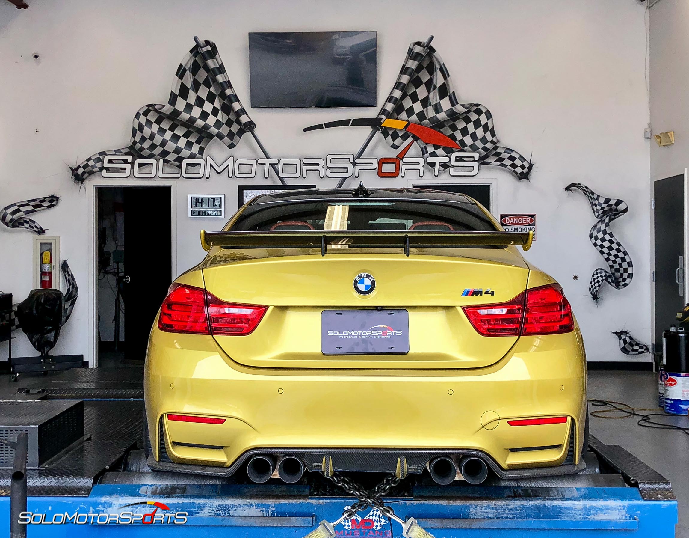 bmw m4 f82 in for power gains downpipes heat exchanger yellow bmw specialists solo motorsports custom tune sms dyno tune downpipes and csf intercooler