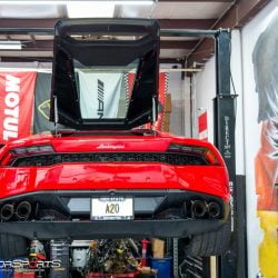 Lamborghini Huracan checked in to get custom exhaust installed. Solo motorsports custom exhaust specialists.