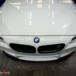 Bmw f10 m5 in for front lip spoiler install. Carbon fibre lip spoiler installed on bmw m5 f10.