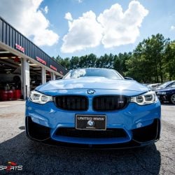 bmw m3 f80 in for akrapovic exhaust and carbon fiber bits, previously installed carbon fiber rearview mirror covers and now were installing carbon fibre diffuser, front splitters and front lip, marina blue m3 looks stunning!