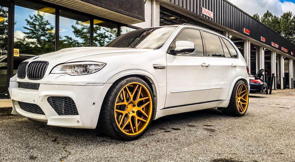 White BMW Car Outside Our Garage